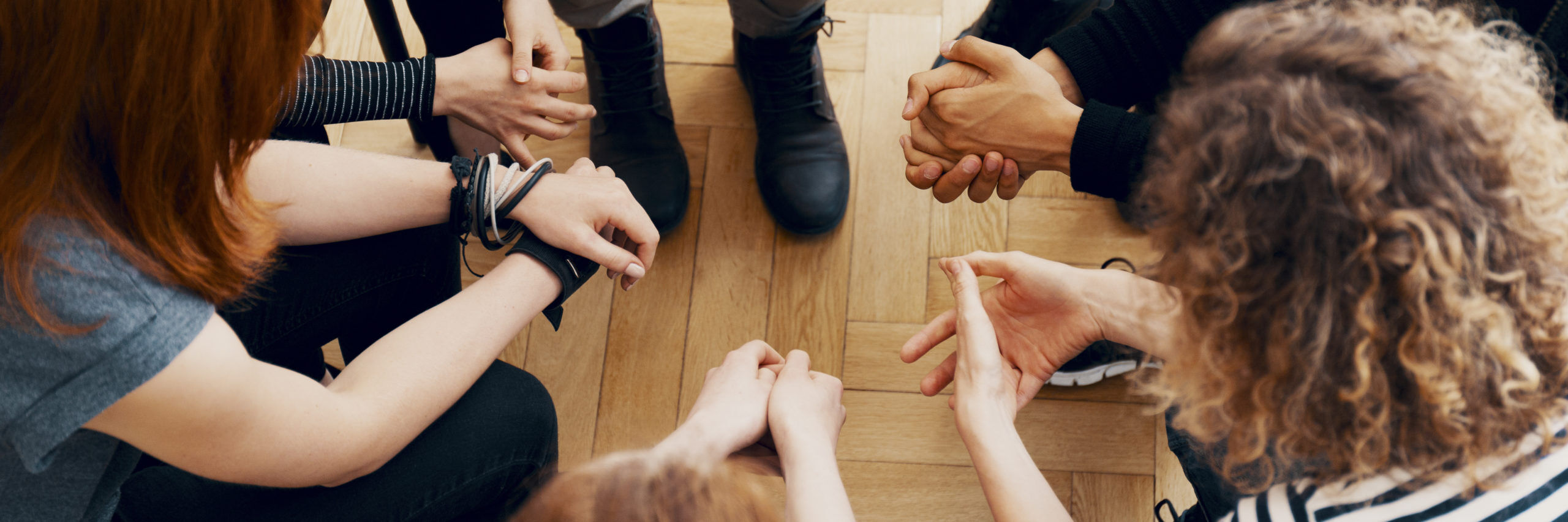 Group of people sitting in a circle