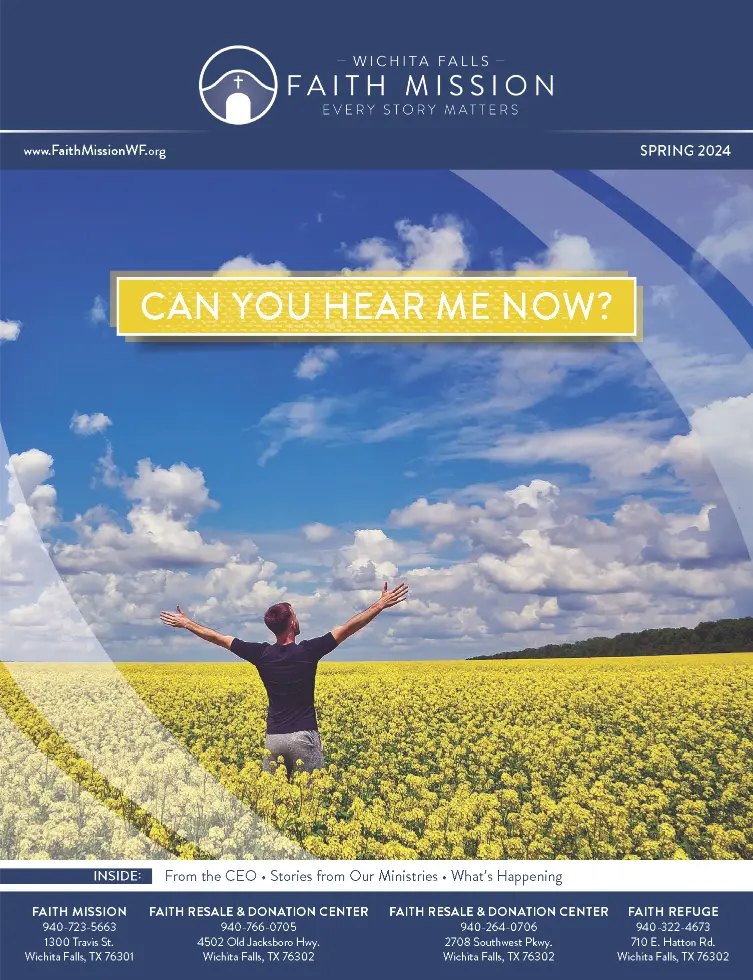 man_holding_his_arms_in_the_air_in_a_field_of_flowers