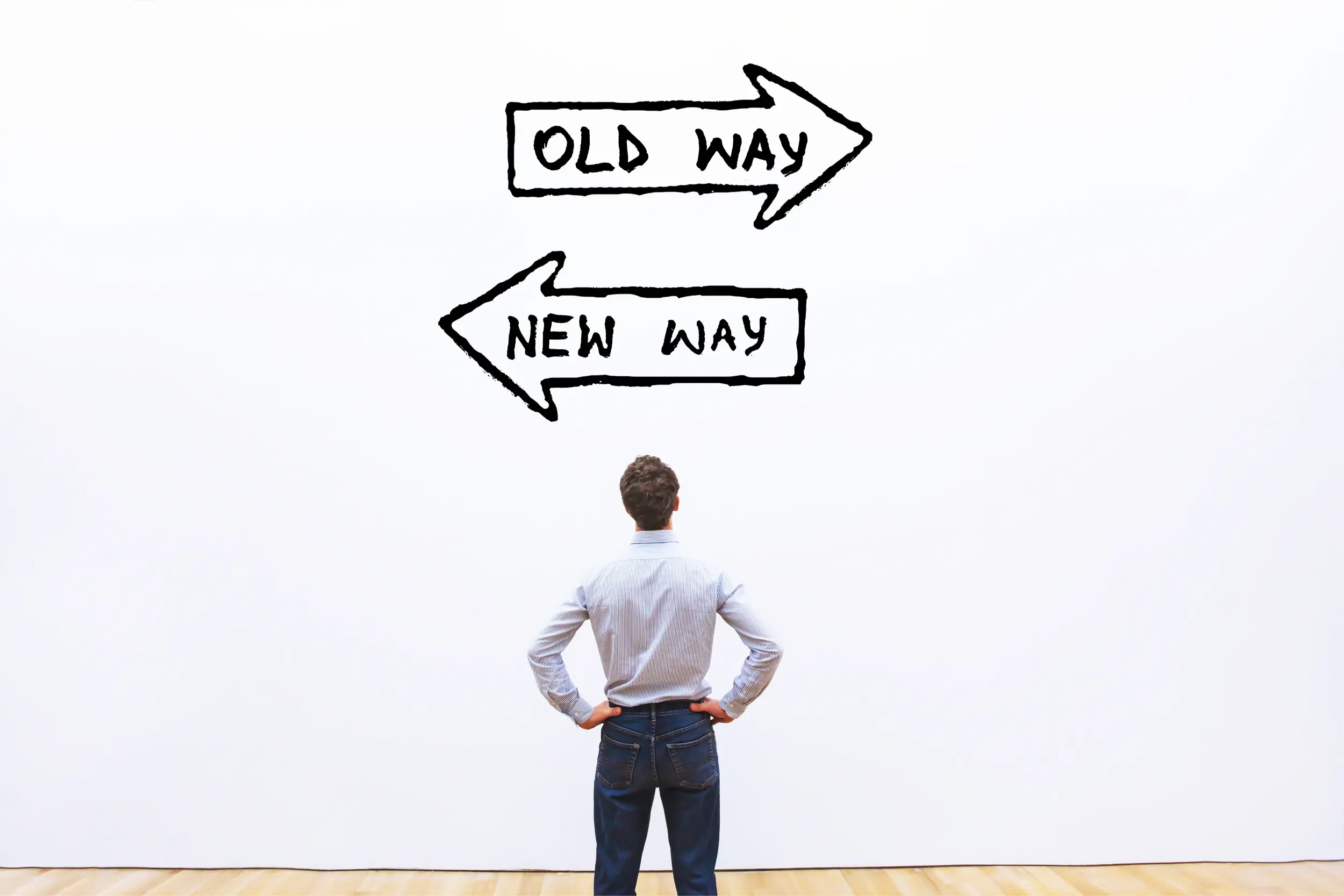 man looking at sign old way vs new way